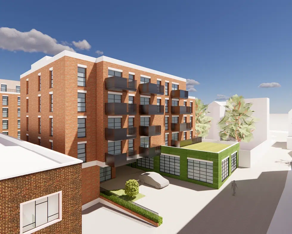 Modern brick apartment building with balconies.