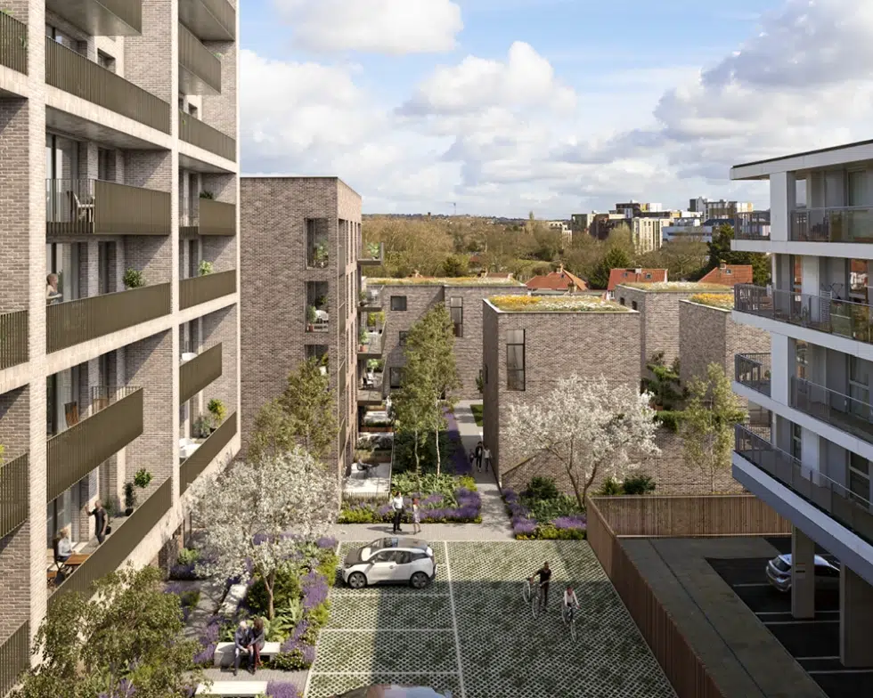 Modern apartment complex with courtyard and parked cars.